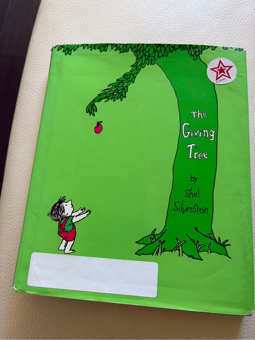 The Giving Tree Kids Book with name written inside in pen
